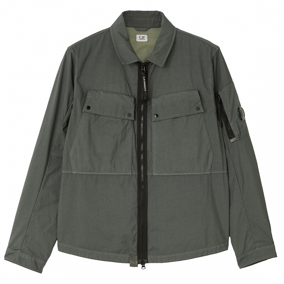 Ветровка C.P. COMPANY TAYLON P GARMENT DYED UTILITY OVERSHIRT LAUREL WREA - 1 фото Ветровка C.P. COMPANY TAYLON P GARMENT DYED UTILITY OVERSHIRT в интернет магазине Peakwww.peakstore.ru - 1 фото
