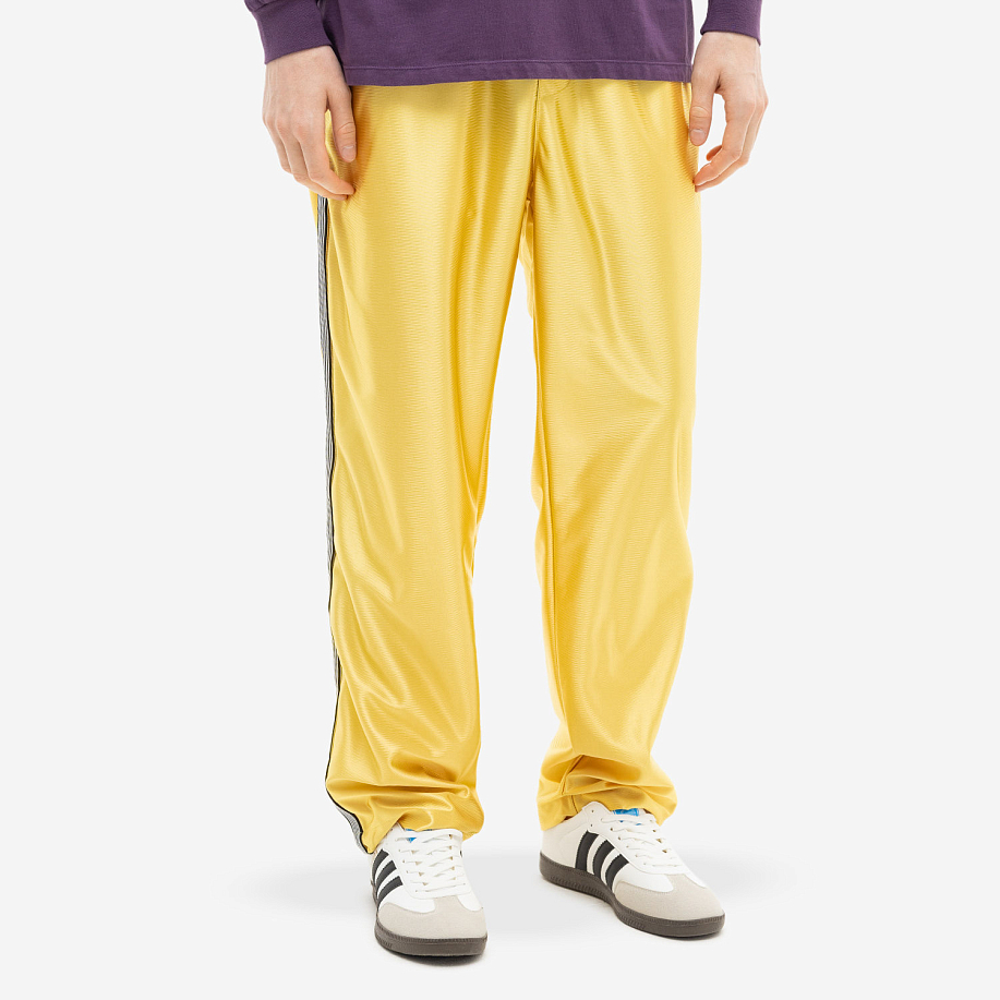 Спортивные брюки NOMA T.D. LINE TRACK PANTS GOLD - 2 фото Спортивные брюки NOMA T.D. LINE TRACK PANTS в интернет магазине Peakwww.peakstore.ru - 2 фото